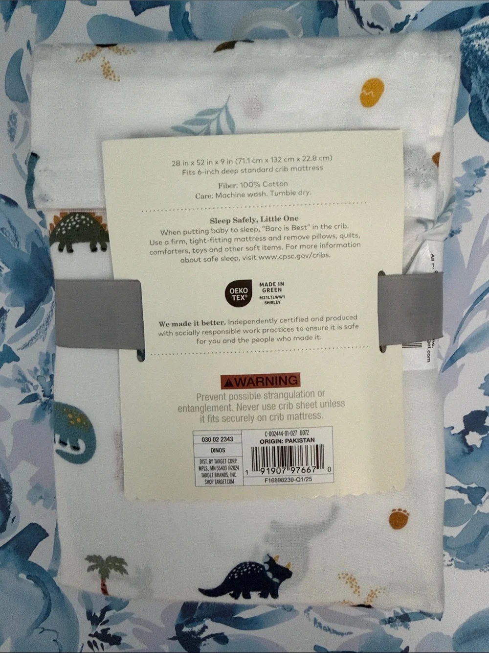 cloud island White Crib Sheet with Colorful Dino and Leaf Print